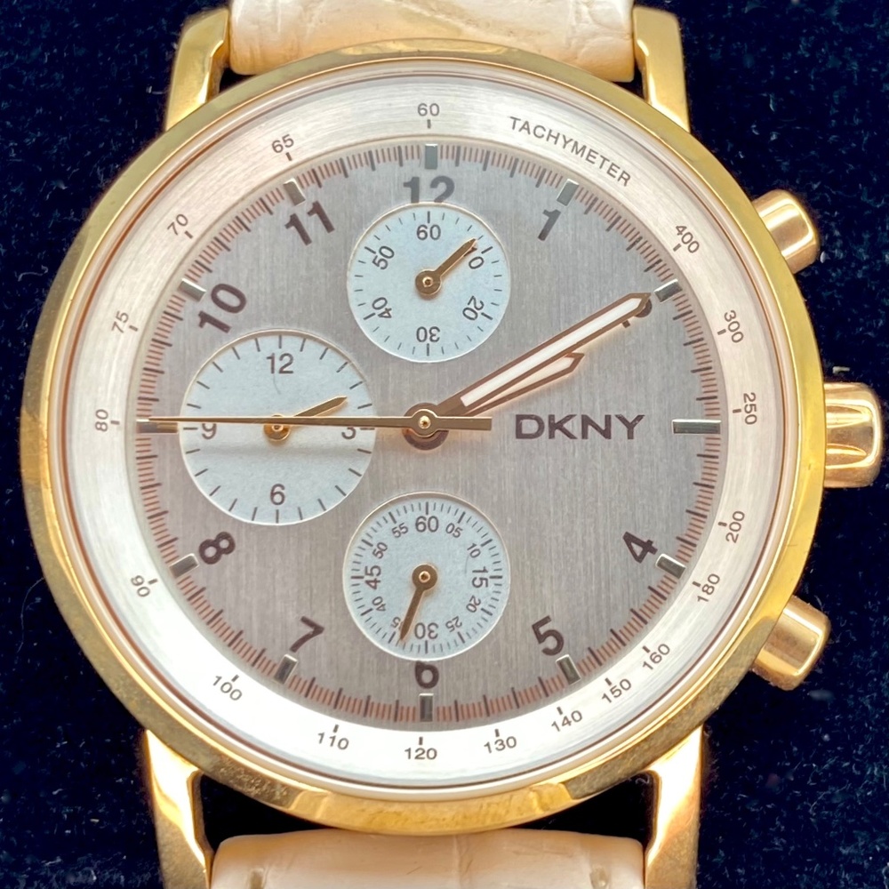 DKNY rose gold and white leather watch